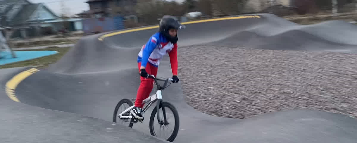 A rider on a pump track